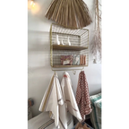 Etagère en métal doré Mobilier Madam Stoltz Seea Concept Store Royan