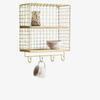 Etagère en métal doré Mobilier Madam Stoltz Seea Concept Store Royan